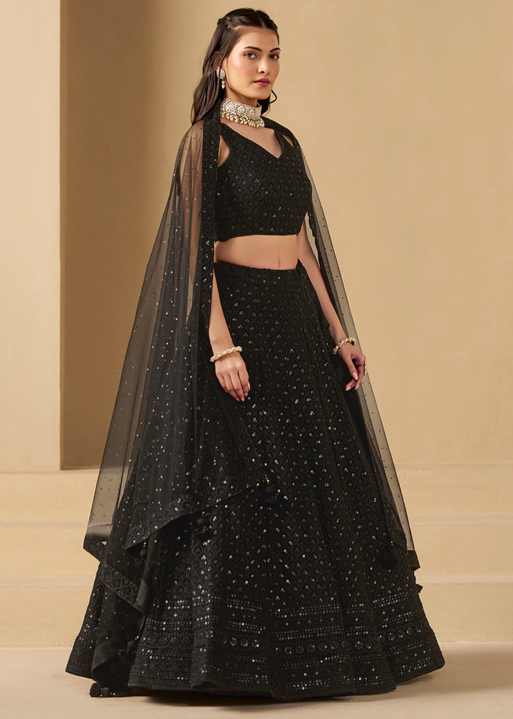 Buy Now Threads & Sequins Work Black Festive Style Lehenga Choli Online in USA, UK, Canada, France, Italy, Germany, Austria, UAE & Worldwide at Empress Clothing.