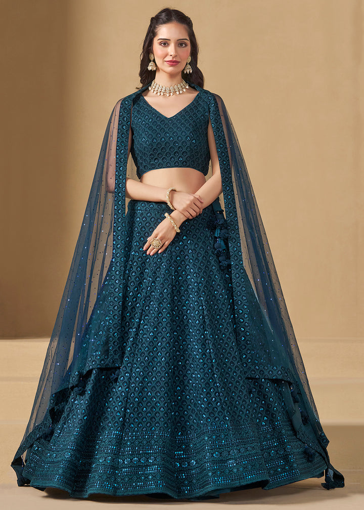 Buy Now Threads & Sequins Work Blue Festive Style Lehenga Choli Online in USA, UK, Canada, France, Italy, Germany, Austria, UAE & Worldwide at Empress Clothing.