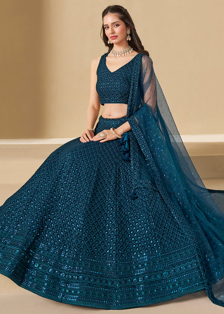 Buy Now Threads & Sequins Work Blue Festive Style Lehenga Choli Online in USA, UK, Canada, France, Italy, Germany, Austria, UAE & Worldwide at Empress Clothing.