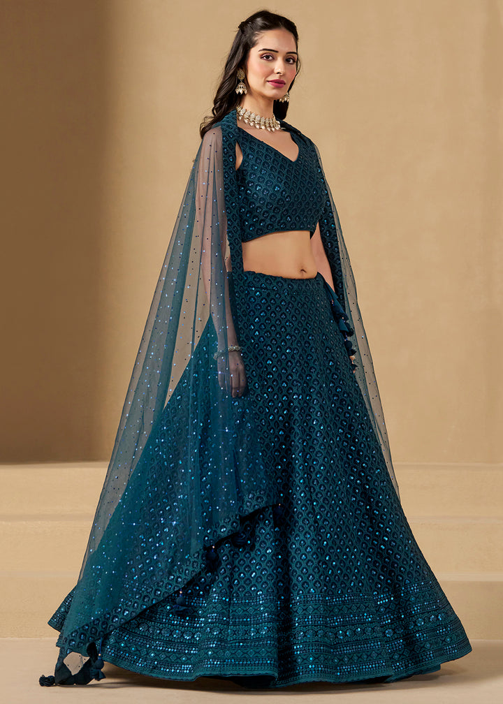 Buy Now Threads & Sequins Work Blue Festive Style Lehenga Choli Online in USA, UK, Canada, France, Italy, Germany, Austria, UAE & Worldwide at Empress Clothing.