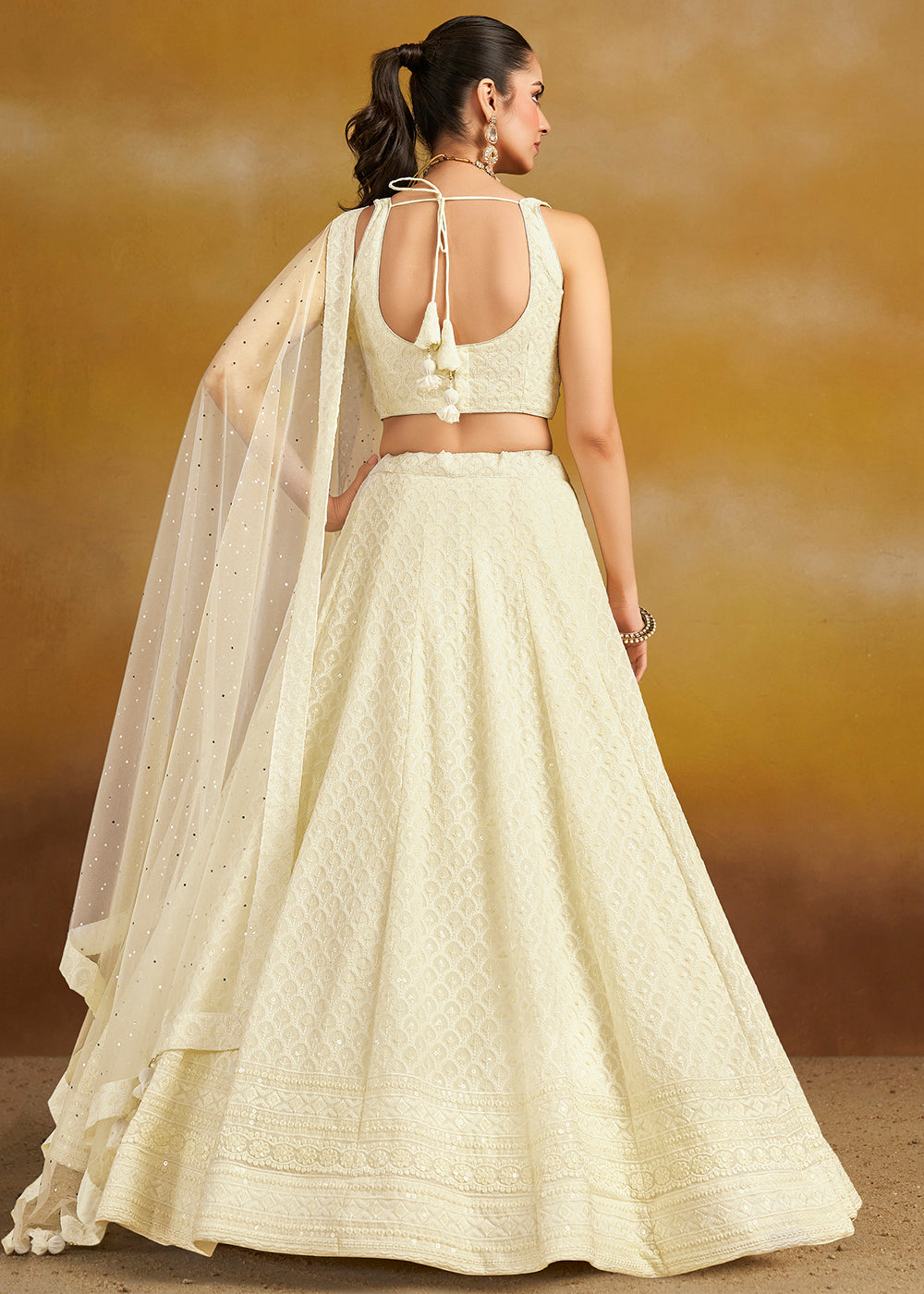 Buy Now Threads & Sequins Work White Festive Style Lehenga Choli Online in USA, UK, Canada, France, Italy, Gerany, Austria, UAE & Worldwide at Empress Clothing.