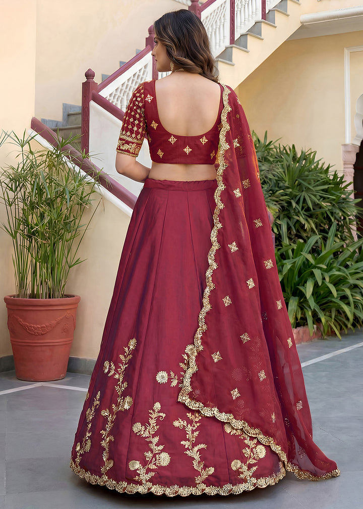 Buy Now Maroon Rangoli Silk Zari &amp; Threads Festive Lehenga Choli Online in US, UK, Canada, France, Italy, Germany, Sweden, UAE &amp; Worldwide at Empress Clothing.
