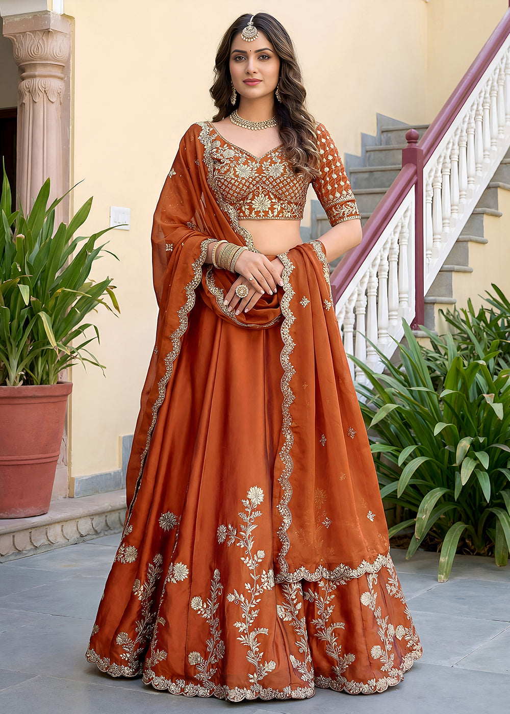 Buy Now Orange Rangoli Silk Zari &amp; Threads Festive Lehenga Choli Online in US, UK, Canada, France, Italy, Germany, Sweden, UAE &amp; Worldwide at Empress Clothing.