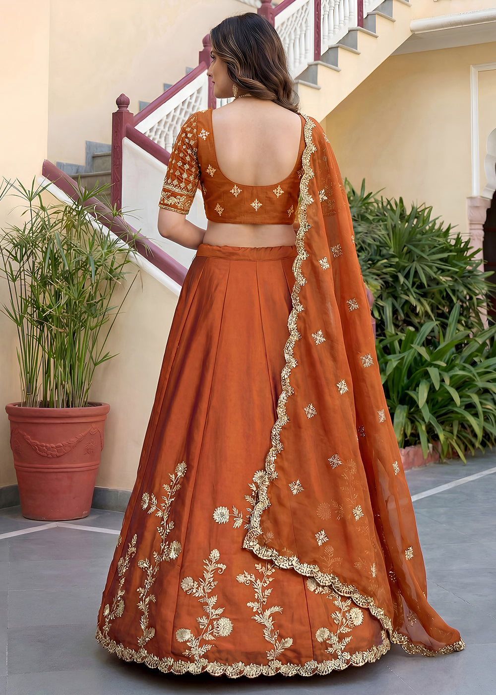 Buy Now Orange Rangoli Silk Zari &amp; Threads Festive Lehenga Choli Online in US, UK, Canada, France, Italy, Germany, Sweden, UAE &amp; Worldwide at Empress Clothing.