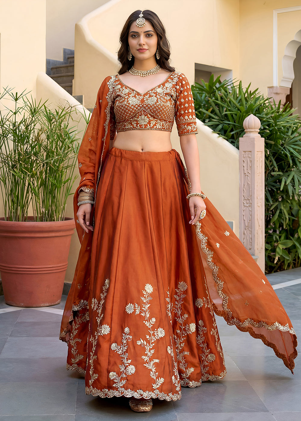 Buy Now Orange Rangoli Silk Zari &amp; Threads Festive Lehenga Choli Online in US, UK, Canada, France, Italy, Germany, Sweden, UAE &amp; Worldwide at Empress Clothing.