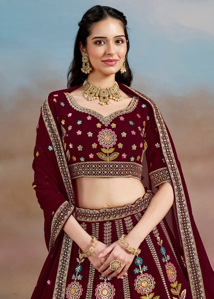 Buy Now Maroon Multi Color Threads Work Festive Lehenga Choli Online in USA, UK, Canada, France, Italy, Germany, Australia, UAE & Worldwide at Empress Clothing.