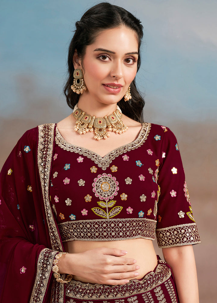 Buy Now Maroon Multi Color Threads Work Festive Lehenga Choli Online in USA, UK, Canada, France, Italy, Germany, Australia, UAE & Worldwide at Empress Clothing.