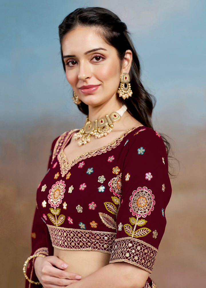 Buy Now Maroon Multi Color Threads Work Festive Lehenga Choli Online in USA, UK, Canada, France, Italy, Germany, Australia, UAE & Worldwide at Empress Clothing.