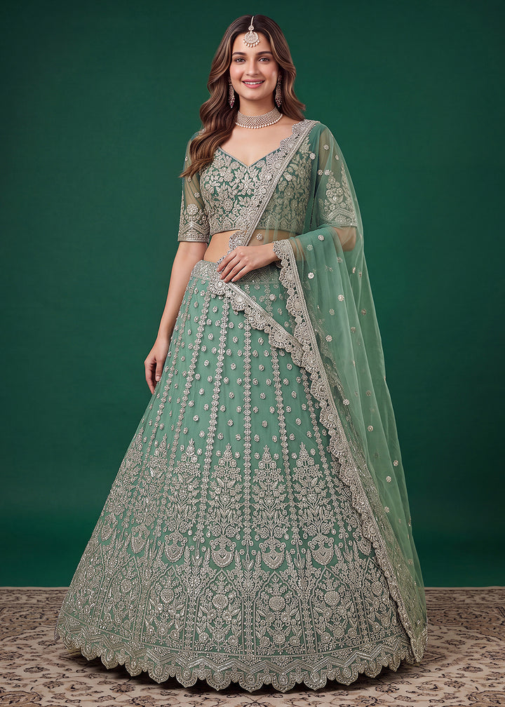 Buy Now Green Zari Dori &amp; Multiple Sequins Wedding Lehenga Choli Online in US, UK, Canada, France, Italy, Germany, Sweden, Austria, UAE &amp; Worldwide at Empress.
