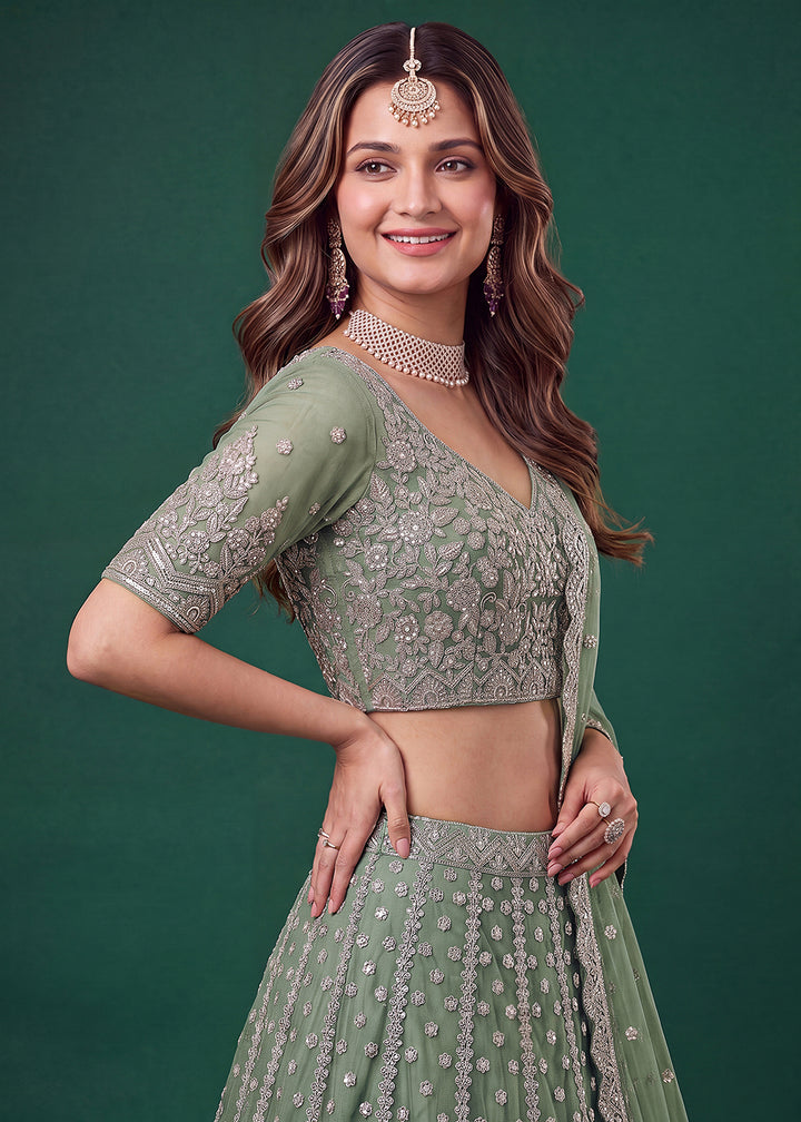 Buy Now Green Zari Dori &amp; Multiple Sequins Wedding Lehenga Choli Online in US, UK, Canada, France, Italy, Germany, Sweden, Austria, UAE &amp; Worldwide at Empress.