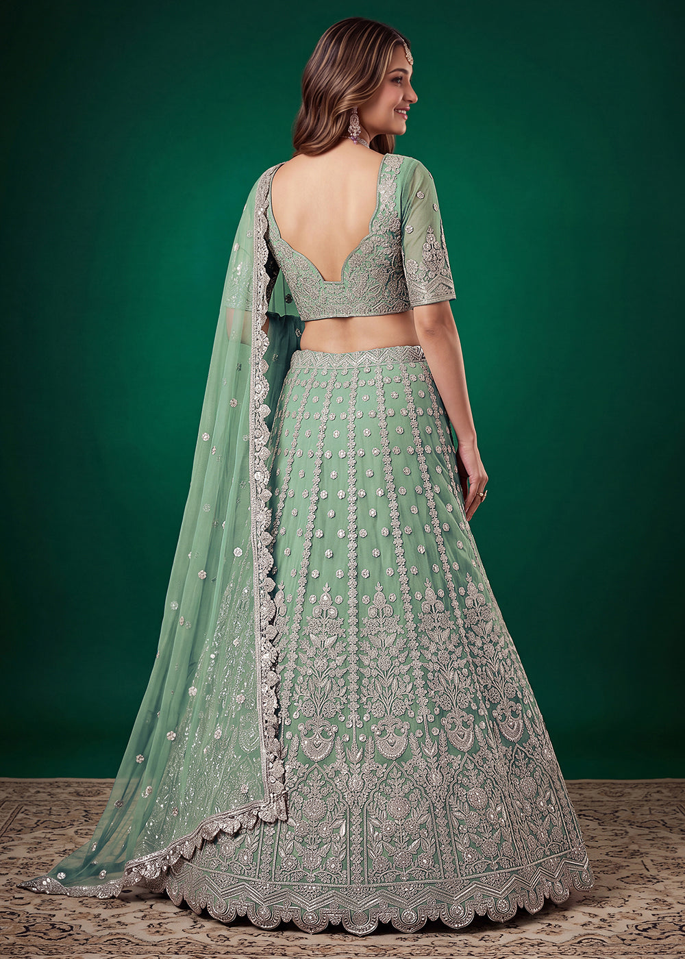 Buy Now Green Zari Dori &amp; Multiple Sequins Wedding Lehenga Choli Online in US, UK, Canada, France, Italy, Germany, Sweden, Austria, UAE &amp; Worldwide at Empress.