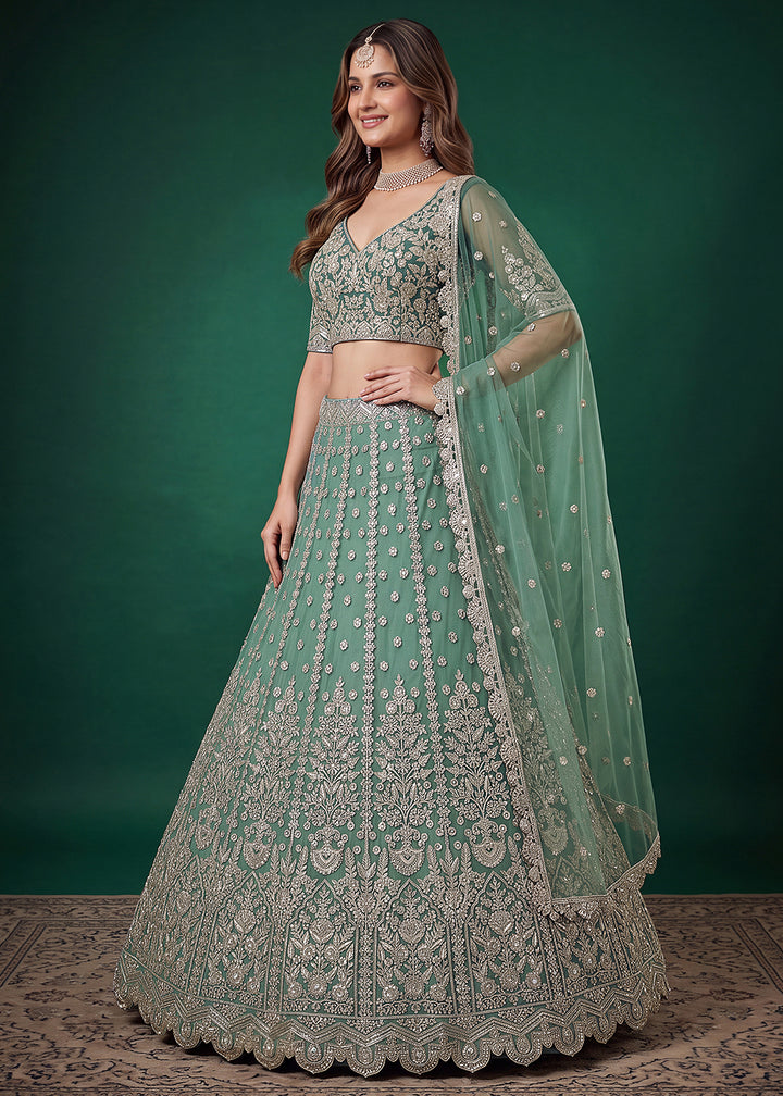Buy Now Green Zari Dori &amp; Multiple Sequins Wedding Lehenga Choli Online in US, UK, Canada, France, Italy, Germany, Sweden, Austria, UAE &amp; Worldwide at Empress.