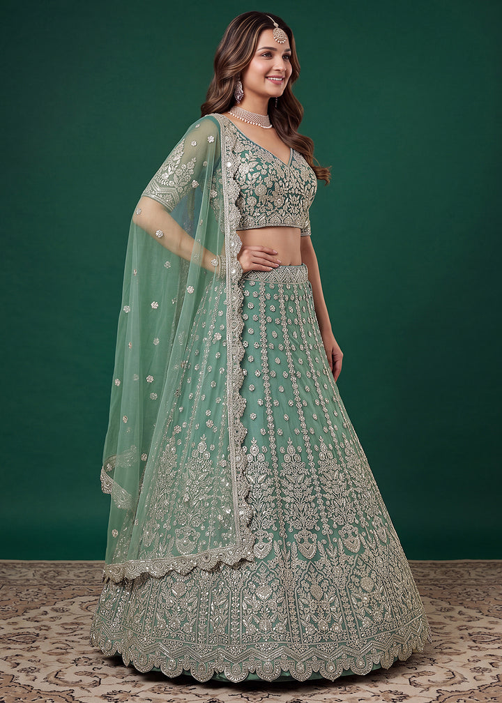 Buy Now Green Zari Dori &amp; Multiple Sequins Wedding Lehenga Choli Online in US, UK, Canada, France, Italy, Germany, Sweden, Austria, UAE &amp; Worldwide at Empress.