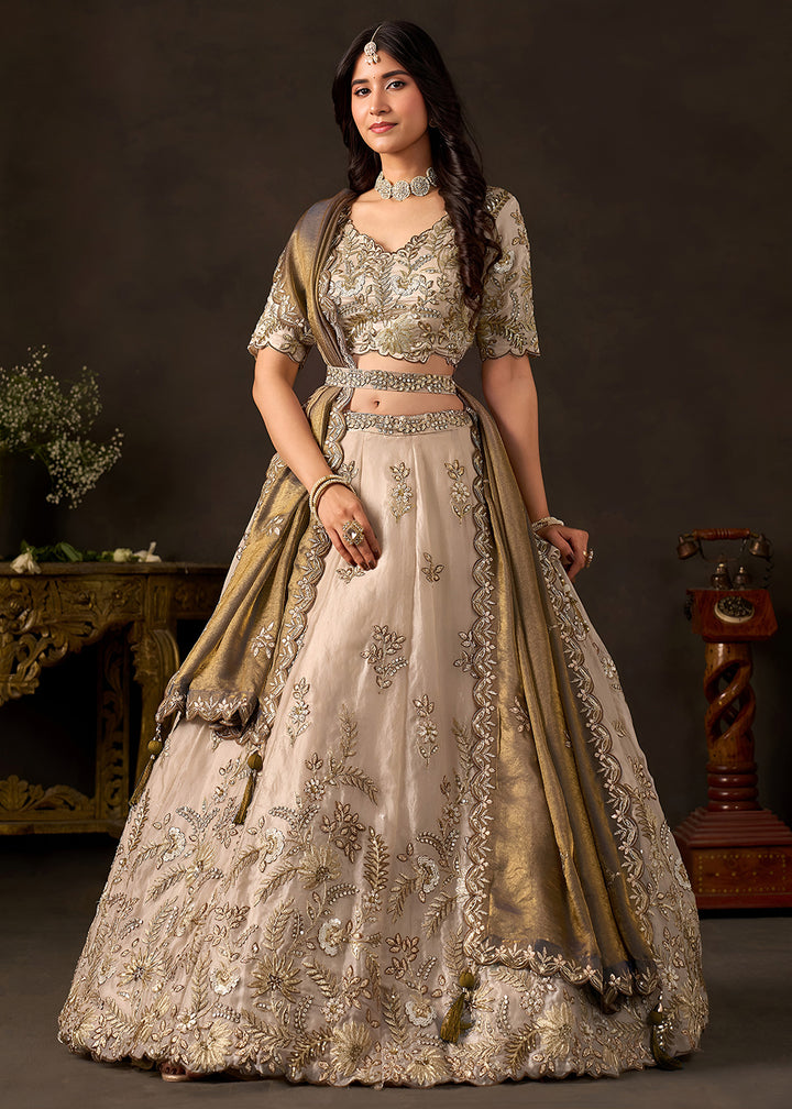 Shop Now Beige Gold Wedding Lehenga Choli with Bronze Dupatta Online in USA, UK, Canada, France, Germany, Spain, Austria, Sweden, UAE &amp; Worldwide at Empress.