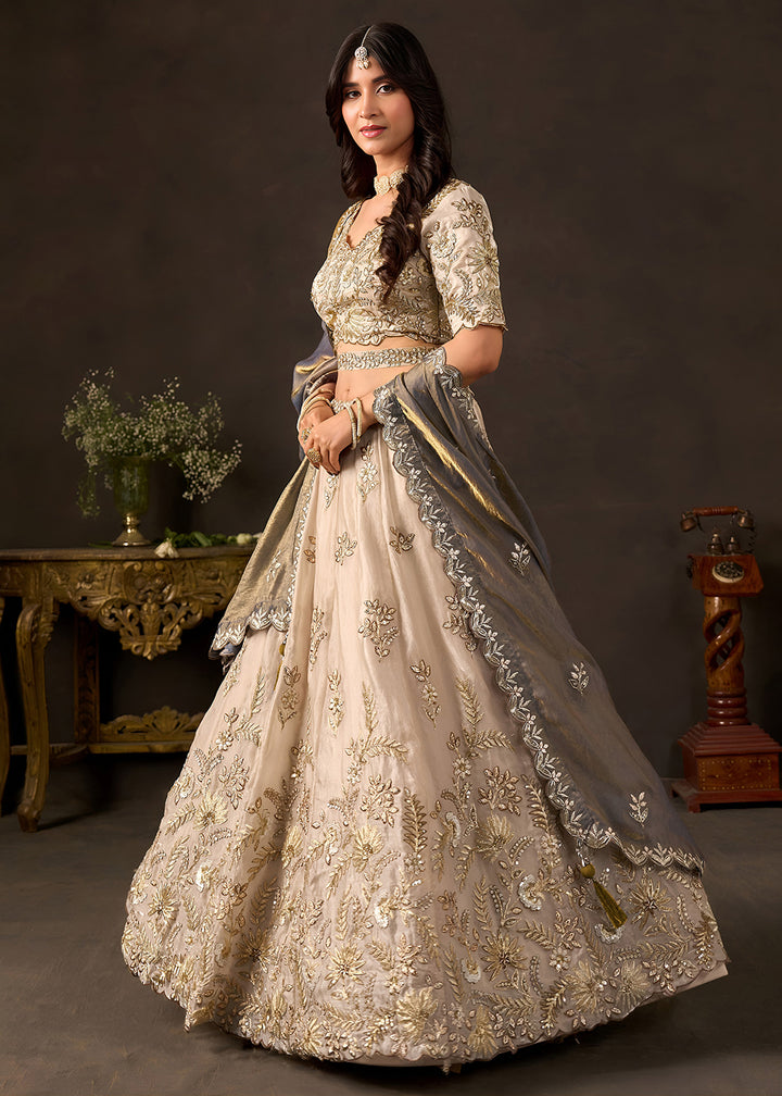 Shop Now Beige Gold Wedding Lehenga Choli with Bronze Dupatta Online in USA, UK, Canada, France, Germany, Spain, Austria, Sweden, UAE &amp; Worldwide at Empress.