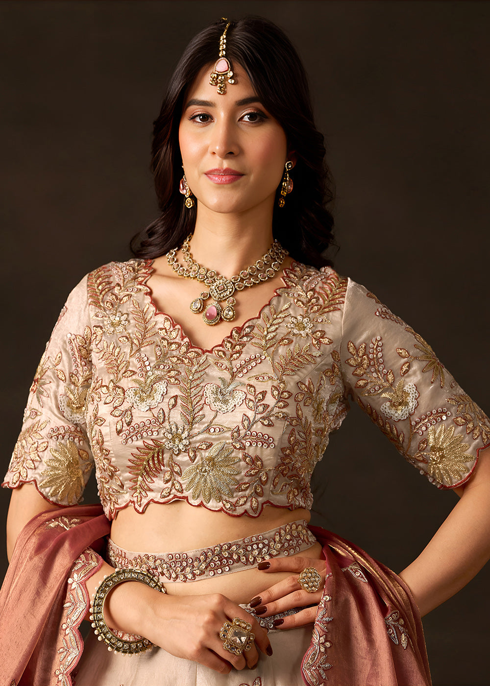 Shop Now Beige Gold Wedding Lehenga Choli with Copper Dupatta Online in USA, UK, Canada, France, Germany, Spain, Austria, Sweden, UAE &amp; Worldwide at Empress.