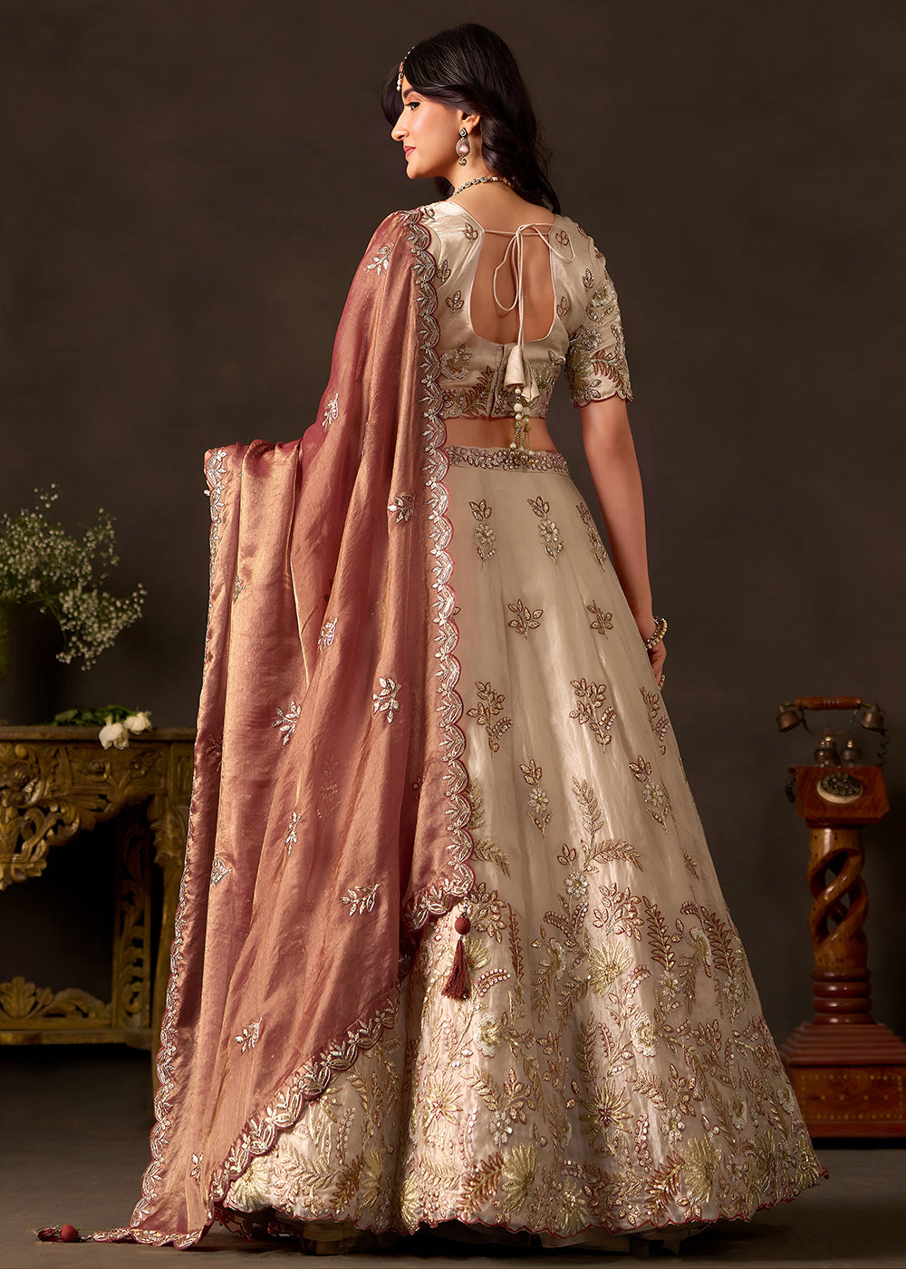 Shop Now Beige Gold Wedding Lehenga Choli with Copper Dupatta Online in USA, UK, Canada, France, Germany, Spain, Austria, Sweden, UAE &amp; Worldwide at Empress.