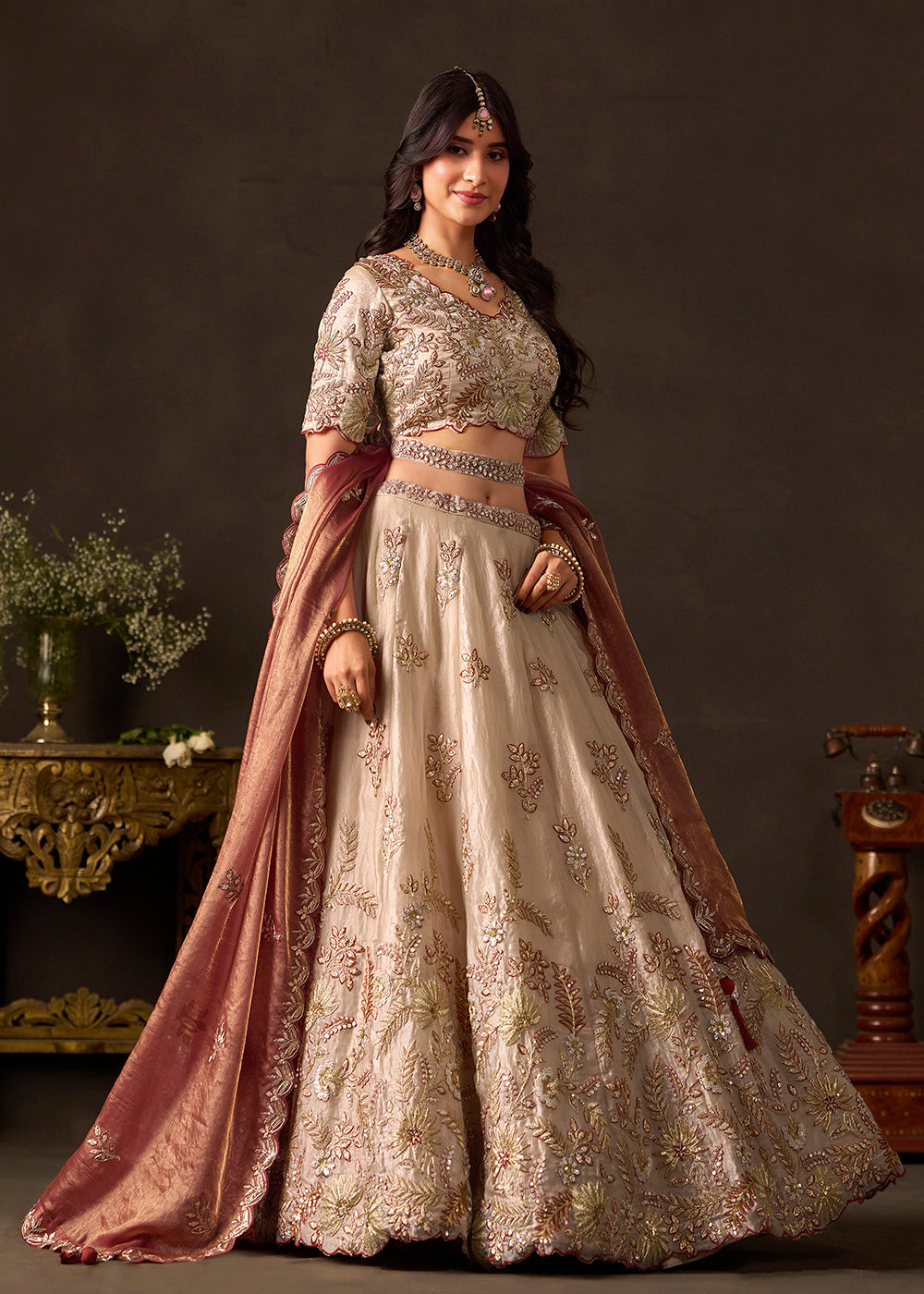 Shop Now Beige Gold Wedding Lehenga Choli with Copper Dupatta Online in USA, UK, Canada, France, Germany, Spain, Austria, Sweden, UAE &amp; Worldwide at Empress.