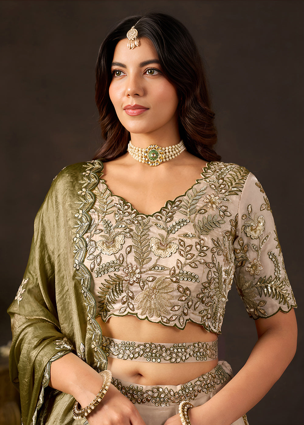 Shop Now Beige Gold Wedding Lehenga Choli with Olive Dupatta Online in USA, UK, Canada, France, Germany, Spain, Austria, Sweden, UAE &amp; Worldwide at Empress.