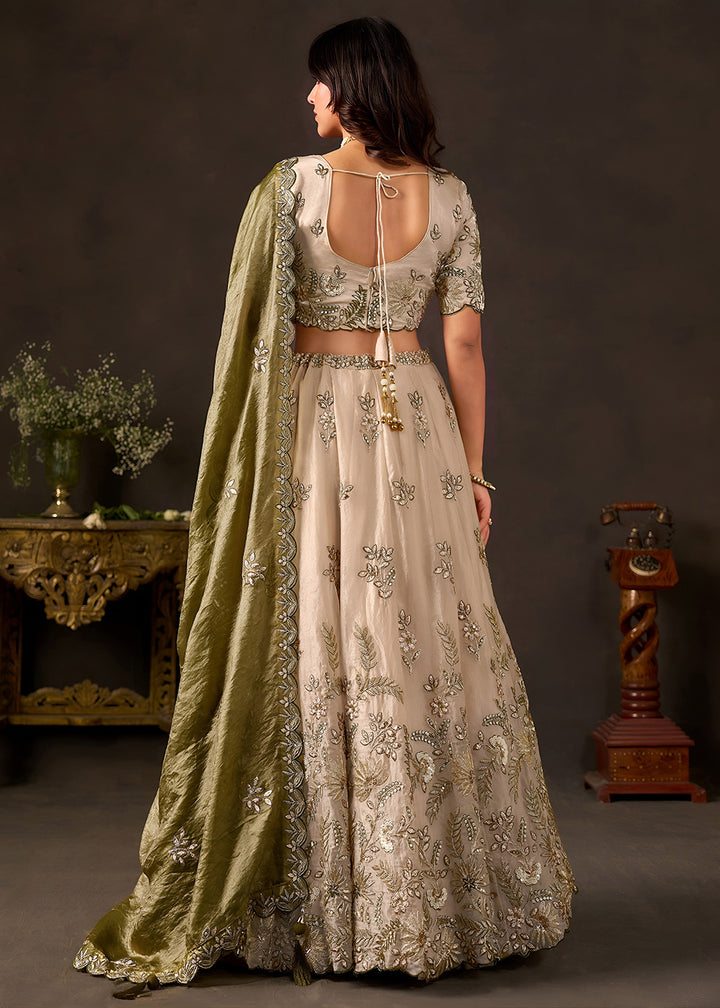 Shop Now Beige Gold Wedding Lehenga Choli with Olive Dupatta Online in USA, UK, Canada, France, Germany, Spain, Austria, Sweden, UAE &amp; Worldwide at Empress.
