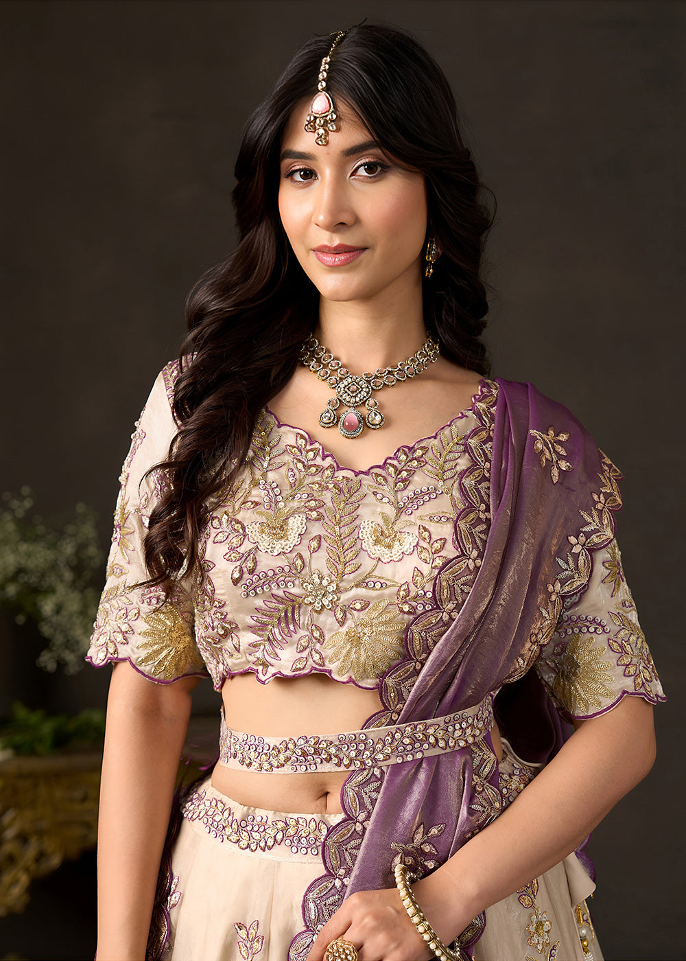 Shop Now Beige Gold Wedding Lehenga Choli with Purple Dupatta Online in USA, UK, Canada, France, Germany, Spain, Austria, Sweden, UAE &amp; Worldwide at Empress.