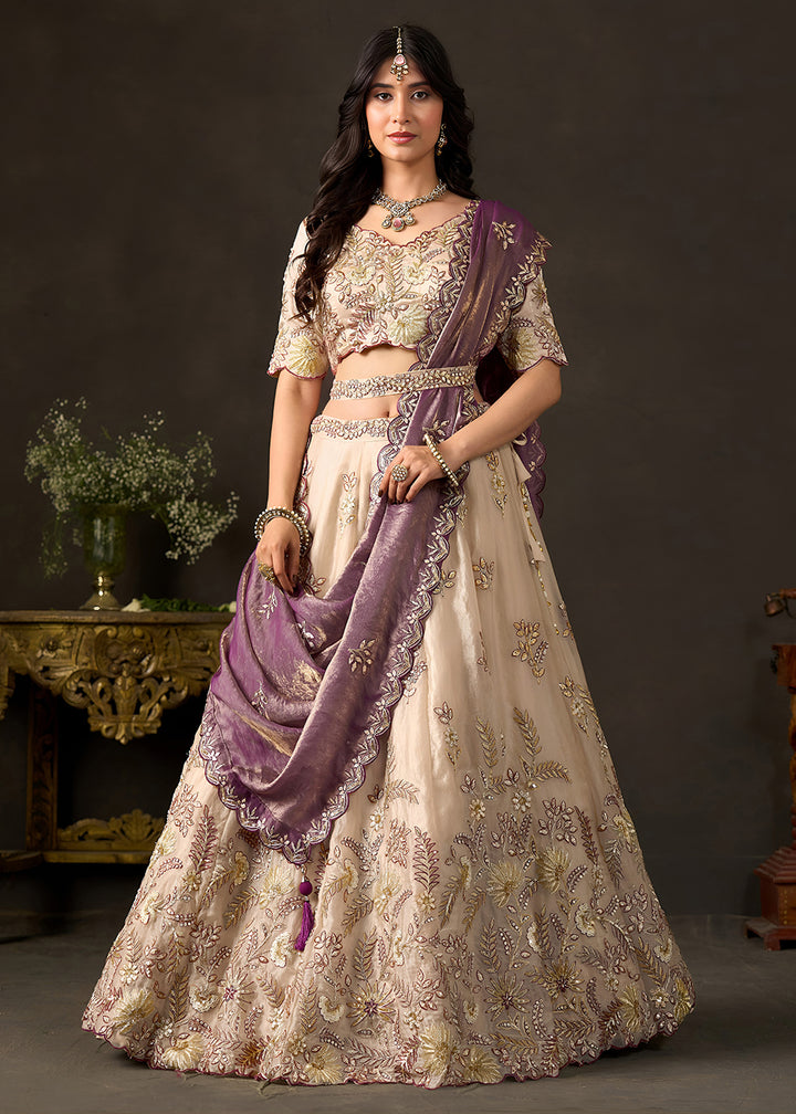 Shop Now Beige Gold Wedding Lehenga Choli with Purple Dupatta Online in USA, UK, Canada, France, Germany, Spain, Austria, Sweden, UAE &amp; Worldwide at Empress.