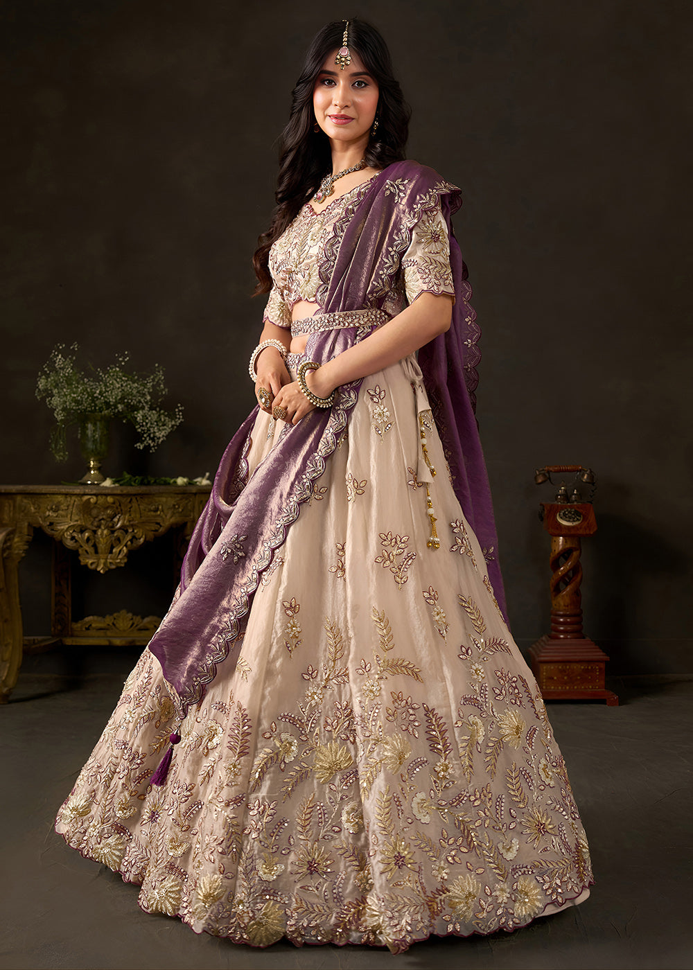 Shop Now Beige Gold Wedding Lehenga Choli with Purple Dupatta Online in USA, UK, Canada, France, Germany, Spain, Austria, Sweden, UAE &amp; Worldwide at Empress.