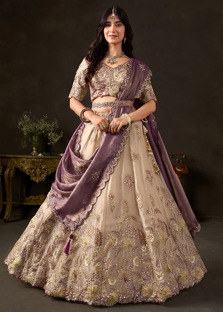 Shop Now Beige Gold Wedding Lehenga Choli with Purple Dupatta Online in USA, UK, Canada, France, Germany, Spain, Austria, Sweden, UAE &amp; Worldwide at Empress.