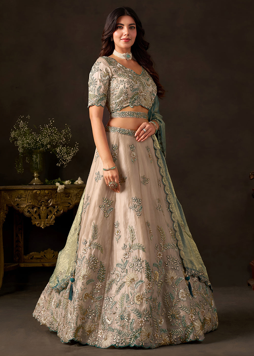 Shop Now Beige Gold Wedding Lehenga Choli with Teal Dupatta Online in USA, UK, Canada, France, Germany, Spain, Austria, Sweden, UAE &amp; Worldwide at Empress.
