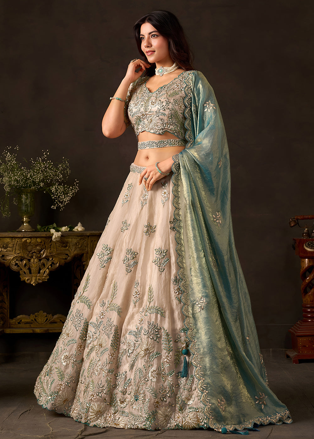 Shop Now Beige Gold Wedding Lehenga Choli with Teal Dupatta Online in USA, UK, Canada, France, Germany, Spain, Austria, Sweden, UAE &amp; Worldwide at Empress.