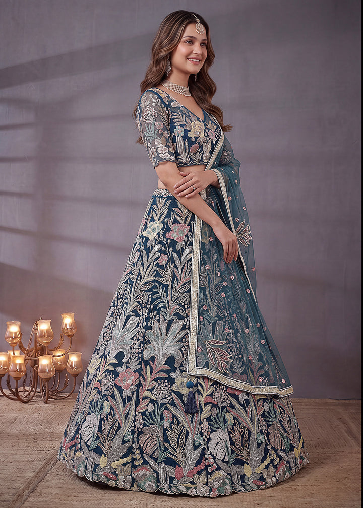 Shop Now Blue Multi Floral Embroidered Wedding Lehenga Choli Online in US, UK, Canada, France, Germany, Spain, Austria, Sweden, UAE &amp; Worldwide at Empress.