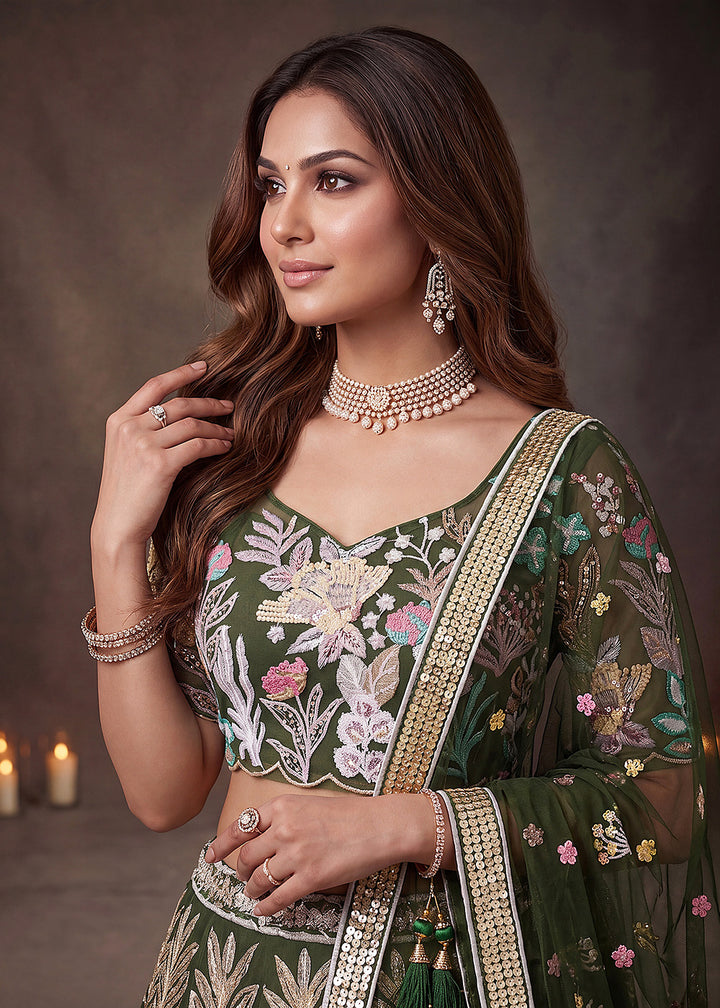 Shop Now Green Multi Floral Embroidered Wedding Lehenga Choli Online in US, UK, Canada, France, Germany, Spain, Austria, Sweden, UAE &amp; Worldwide at Empress.