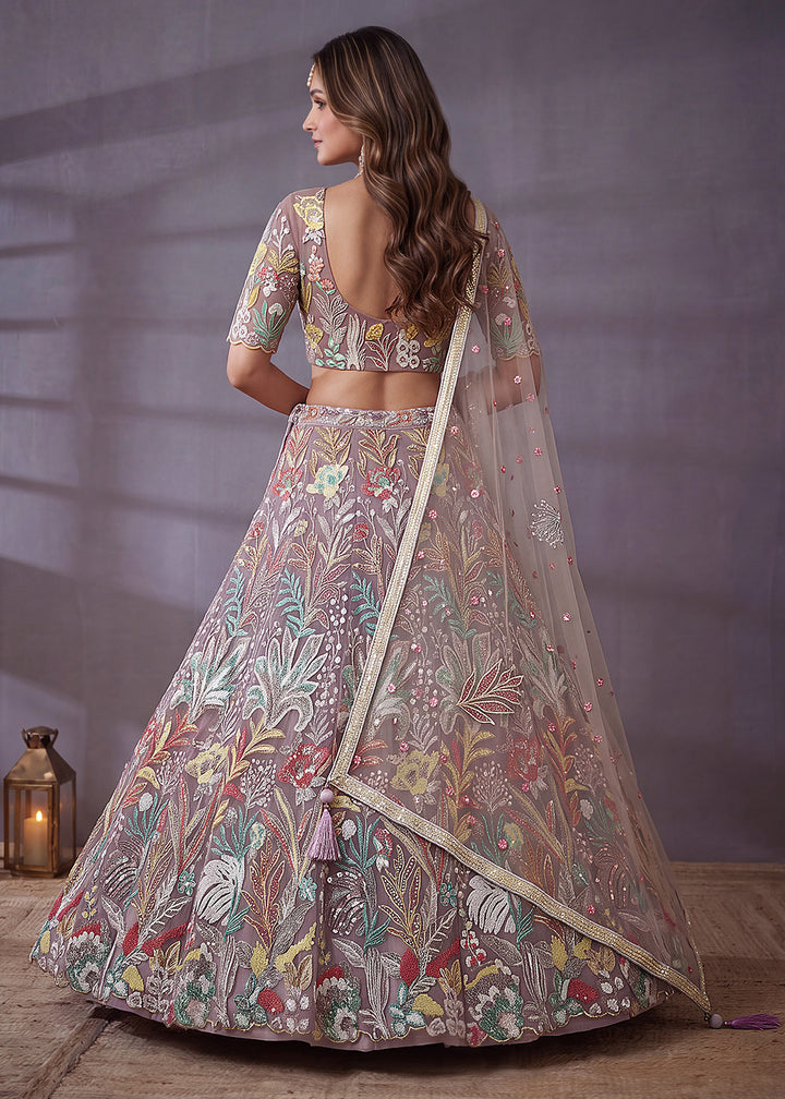 Shop Now Lavender Multi Floral Embroidered Wedding Lehenga Choli Online in US, UK, Canada, France, Germany, Spain, Austria, Sweden, UAE &amp; Worldwide at Empress.