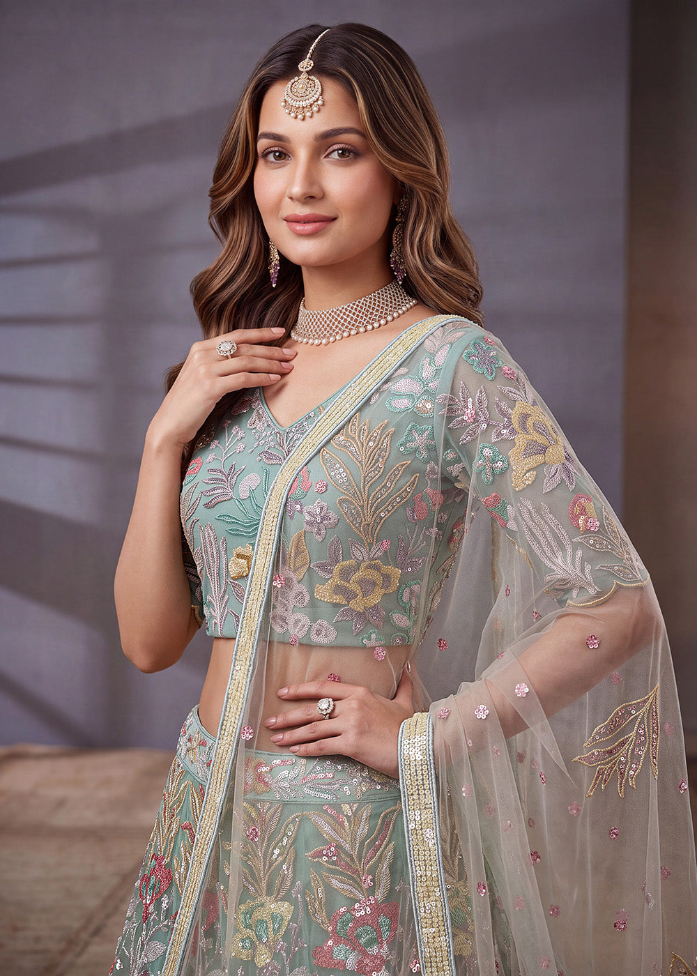 Shop Now Sea Blue Multi Floral Embroidered Wedding Lehenga Choli Online in US, UK, Canada, France, Germany, Spain, Austria, Sweden, UAE & Worldwide at Empress.