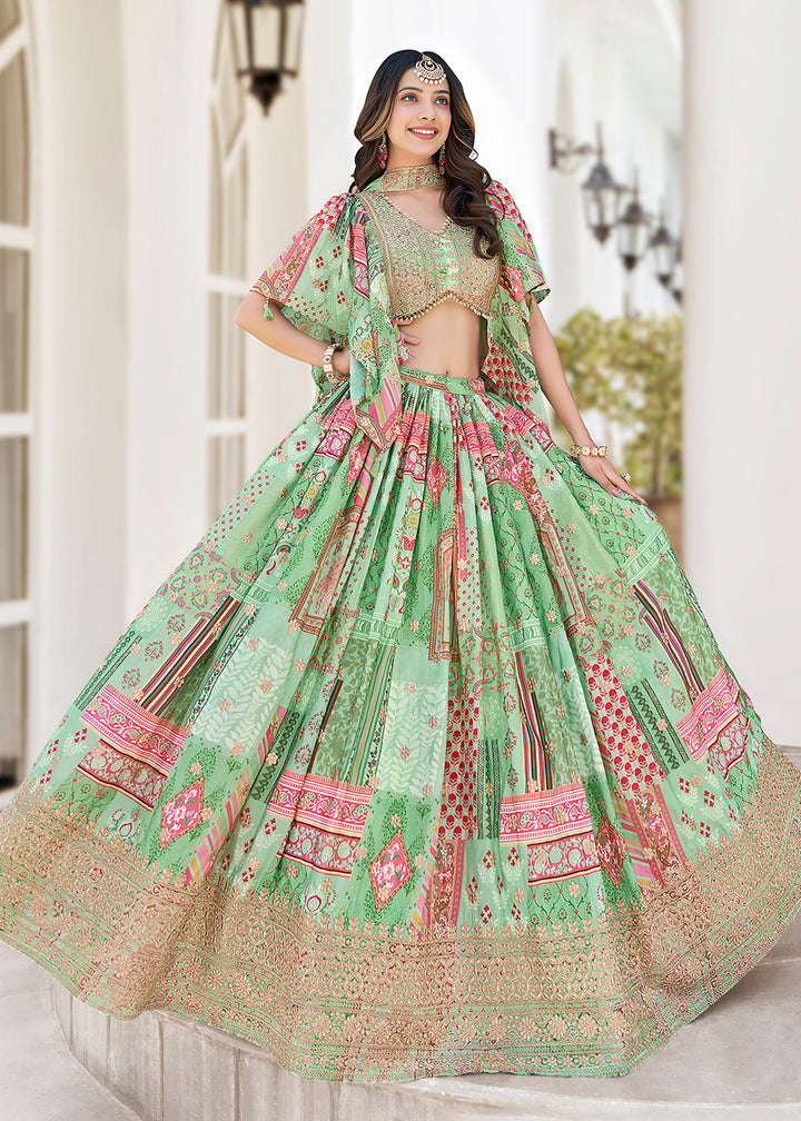 Buy Now Green Printed & Zari Dori Embroidered Lehenga Choli Online in US, UK, Canada, France, Italy, Germany, Australia, UAE, Spain & Worldwide at Empress.