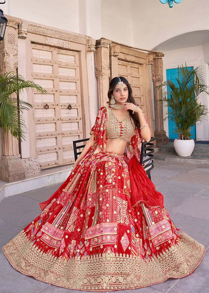 Buy Now Red Printed & Zari Dori Embroidered Lehenga Choli Online in US, UK, Canada, France, Italy, Germany, Australia, UAE, Spain & Worldwide at Empress.