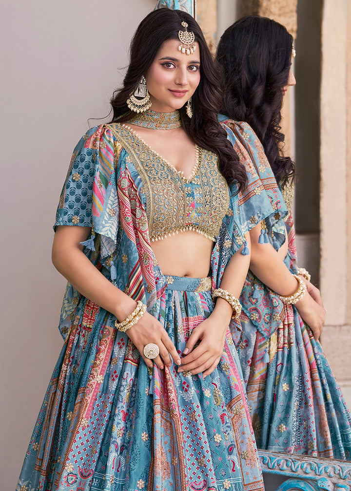 Buy Now Sky Printed & Zari Dori Embroidered Lehenga Choli Online in US, UK, Canada, France, Italy, Germany, Australia, UAE, Spain & Worldwide at Empress.