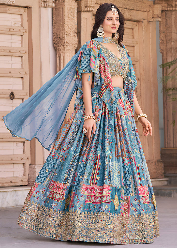 Buy Now Sky Printed & Zari Dori Embroidered Lehenga Choli Online in US, UK, Canada, France, Italy, Germany, Australia, UAE, Spain & Worldwide at Empress.