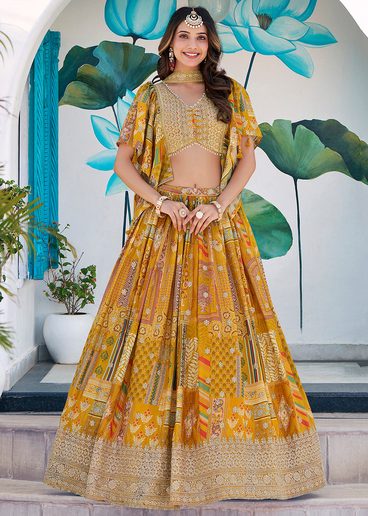 Buy Now Yellow Printed & Zari Dori Embroidered Lehenga Choli Online in US, UK, Canada, France, Italy, Germany, Australia, UAE, Spain & Worldwide at Empress.
