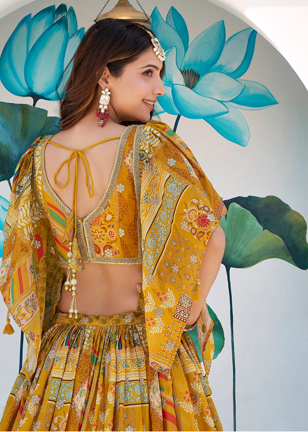 Buy Now Yellow Printed & Zari Dori Embroidered Lehenga Choli Online in US, UK, Canada, France, Italy, Germany, Australia, UAE, Spain & Worldwide at Empress.