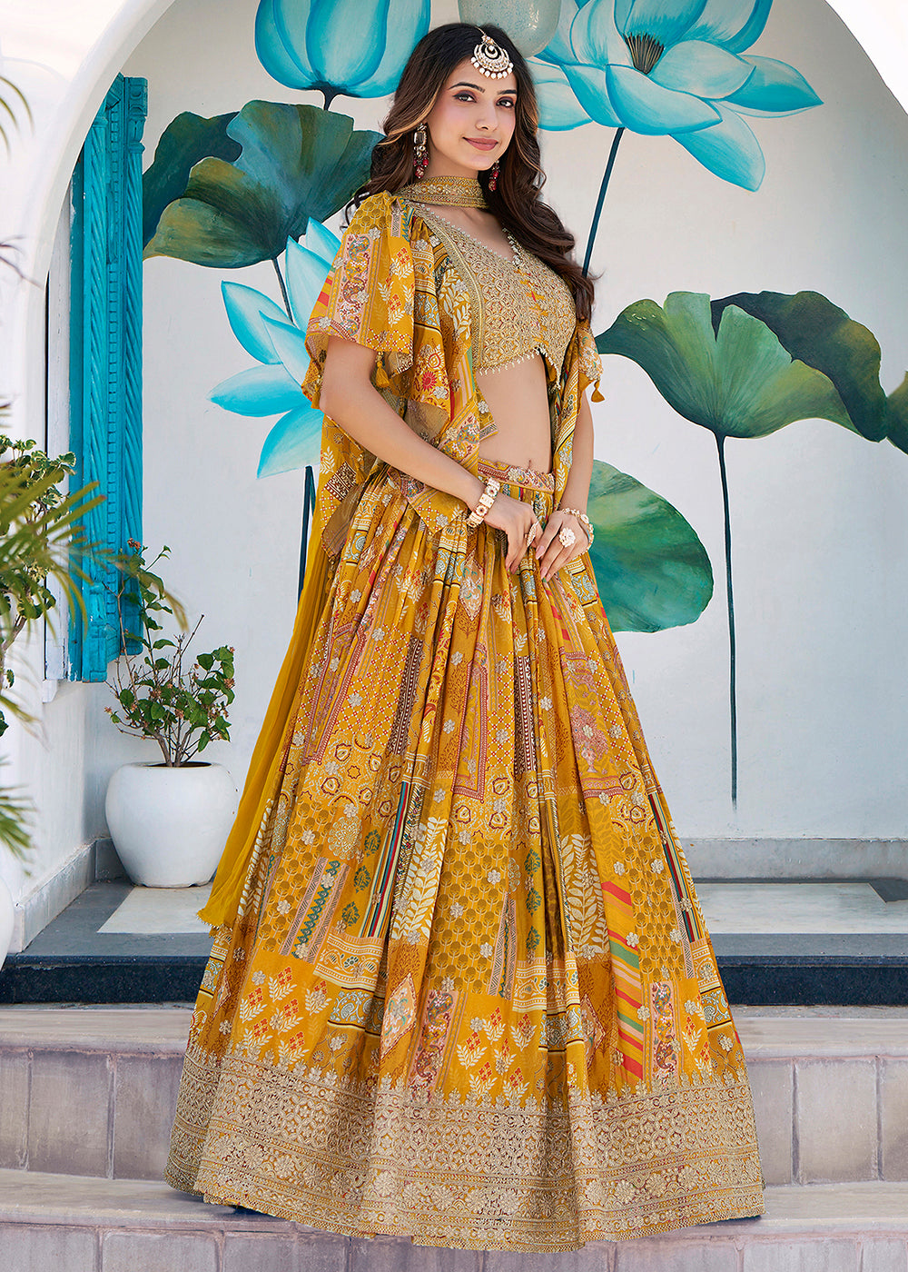 Buy Now Yellow Printed & Zari Dori Embroidered Lehenga Choli Online in US, UK, Canada, France, Italy, Germany, Australia, UAE, Spain & Worldwide at Empress.