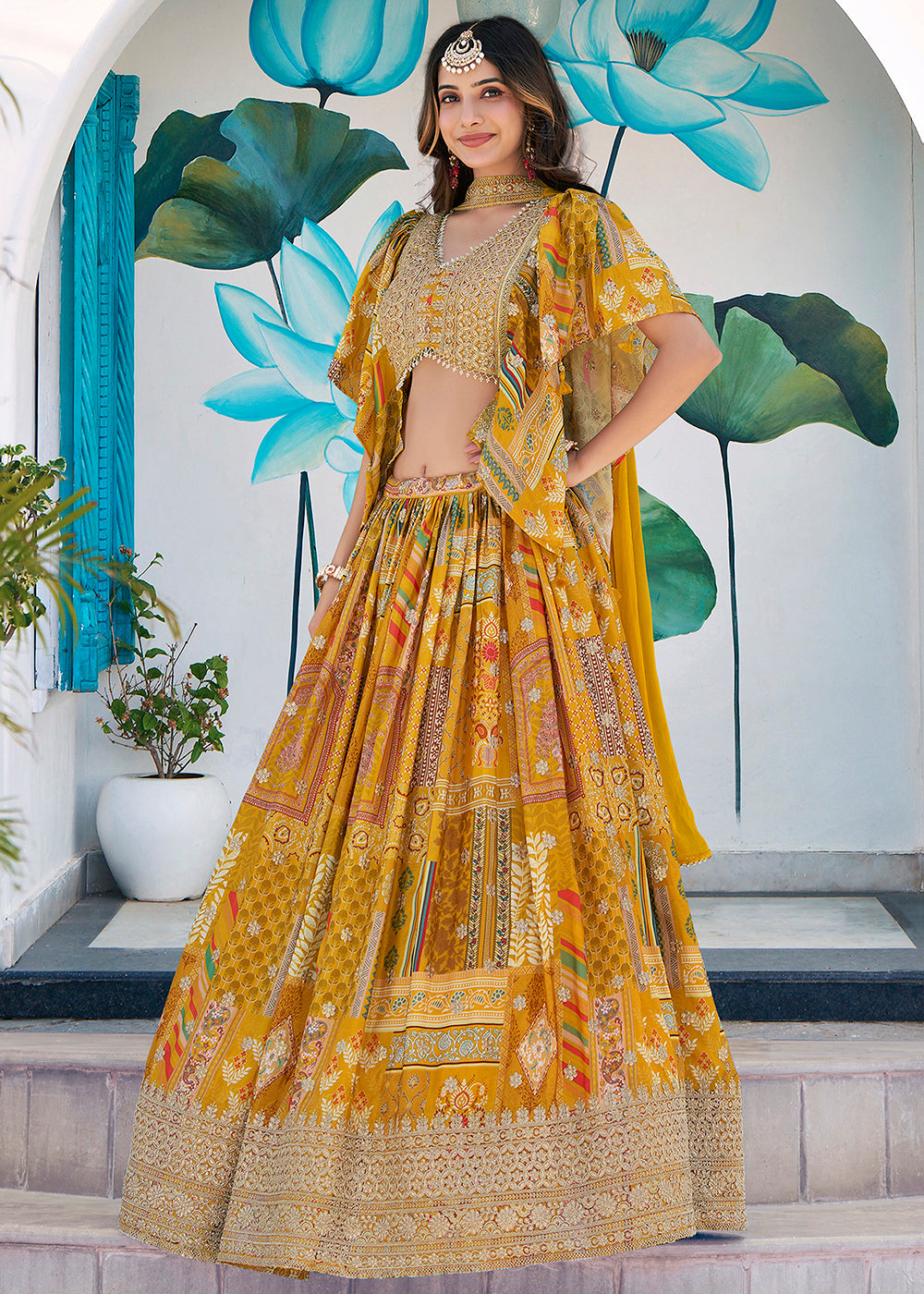 Buy Now Yellow Printed & Zari Dori Embroidered Lehenga Choli Online in US, UK, Canada, France, Italy, Germany, Australia, UAE, Spain & Worldwide at Empress.