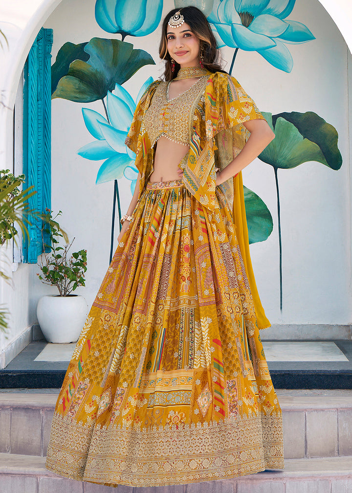 Buy Now Yellow Printed & Zari Dori Embroidered Lehenga Choli Online in US, UK, Canada, France, Italy, Germany, Australia, UAE, Spain & Worldwide at Empress.