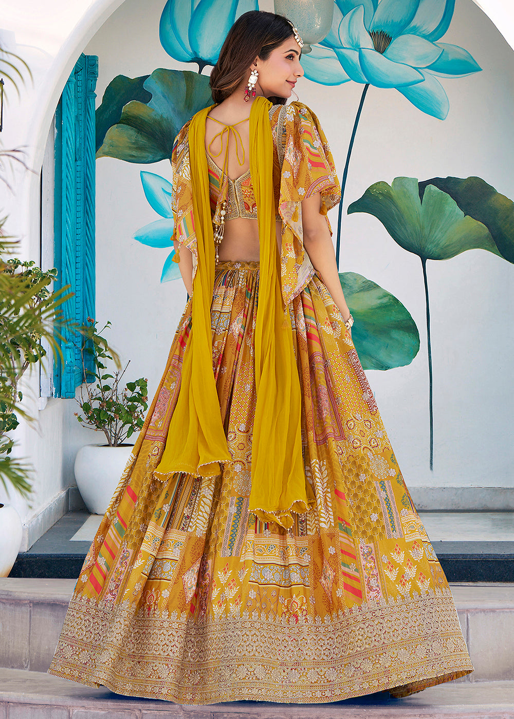 Buy Now Yellow Printed & Zari Dori Embroidered Lehenga Choli Online in US, UK, Canada, France, Italy, Germany, Australia, UAE, Spain & Worldwide at Empress.