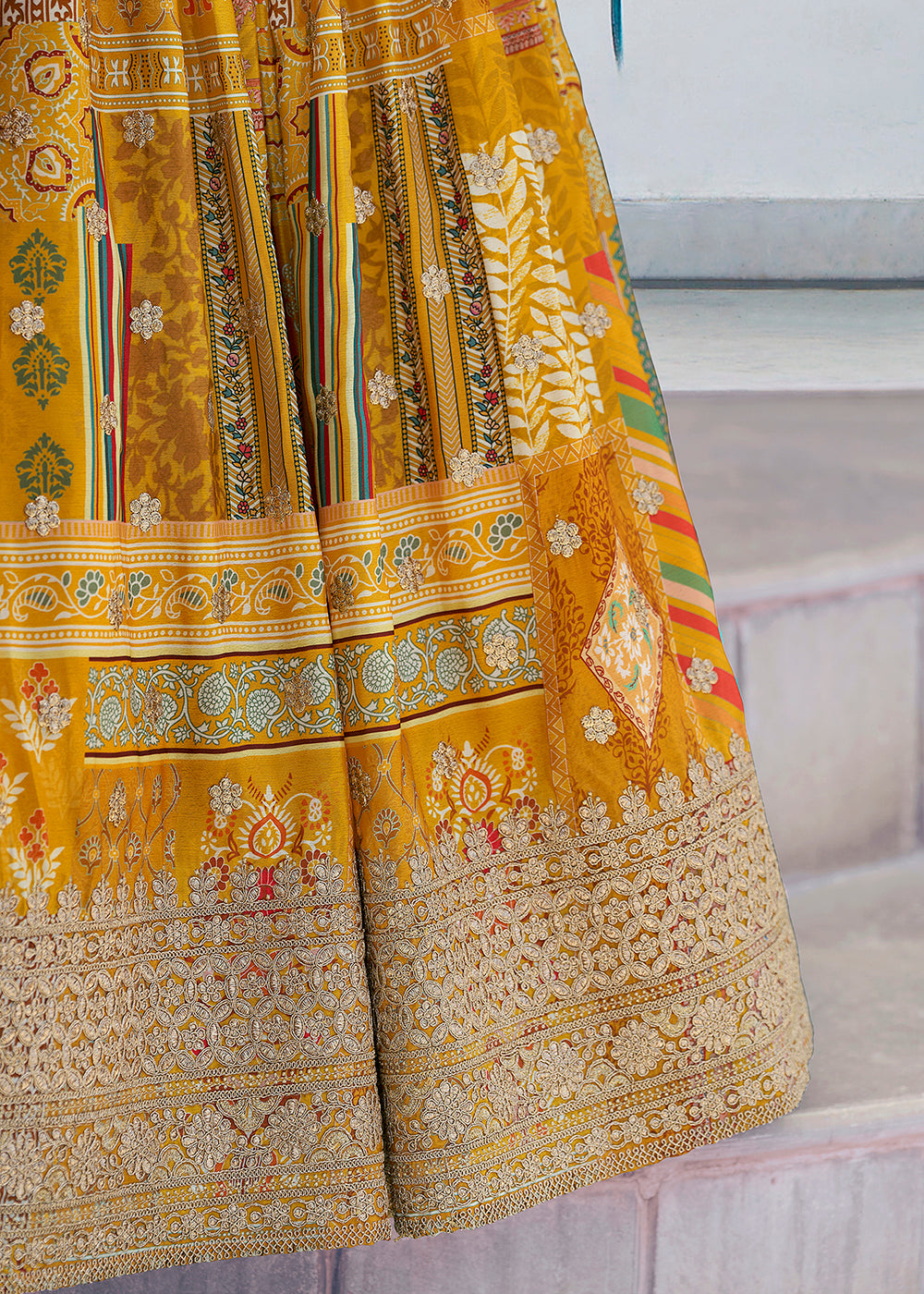 Buy Now Yellow Printed & Zari Dori Embroidered Lehenga Choli Online in US, UK, Canada, France, Italy, Germany, Australia, UAE, Spain & Worldwide at Empress.