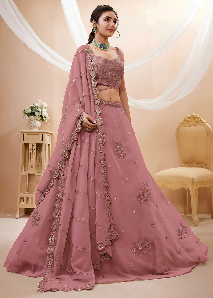 Buy Now Peach Sequins &amp; Dori Embroidered Festive Lehenga Choli Online in US, UK, Canada, France, Italy, Germany, Sweden, Australia, UAE &amp; Worldwide at Empress.