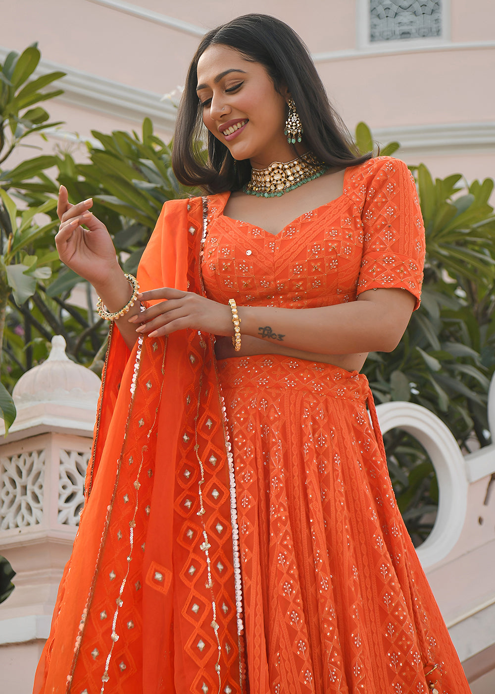 Buy Now Wedding Festive Wear Orange Designer Lehenga Choli Online in US, UK, Canada, France, Italy, Germany, Australia, Greece, UAE & Worldwide at Empress.