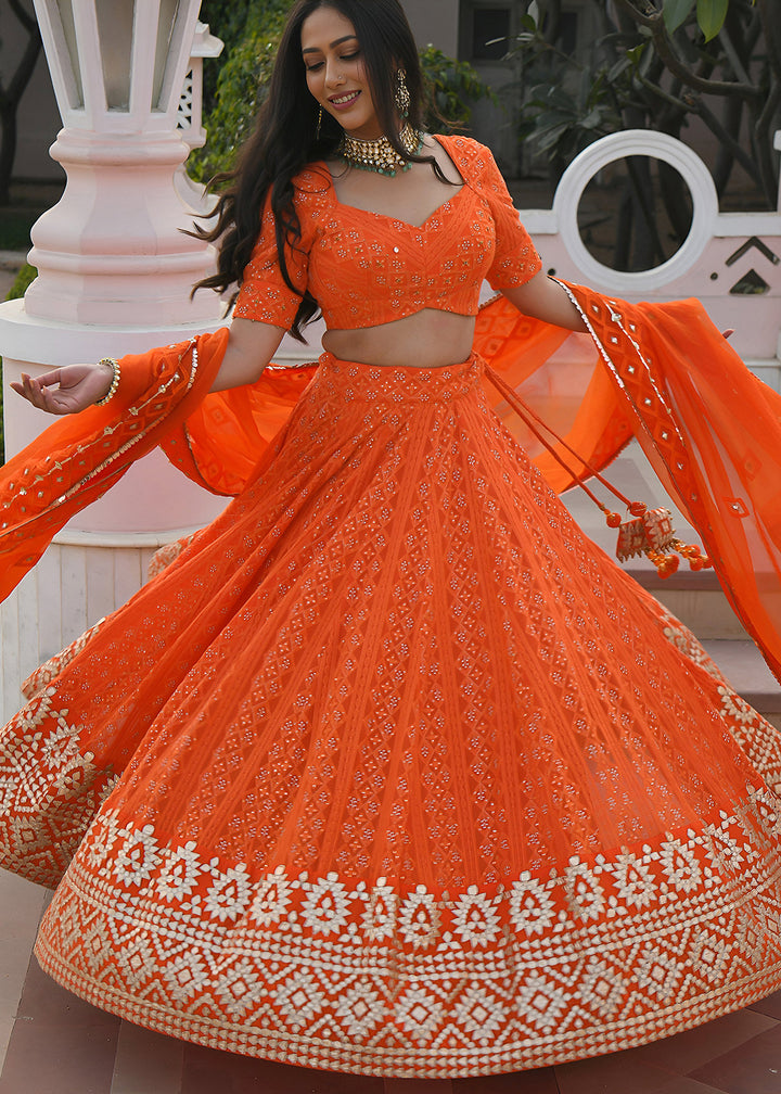 Buy Now Wedding Festive Wear Orange Designer Lehenga Choli Online in US, UK, Canada, France, Italy, Germany, Australia, Greece, UAE &amp; Worldwide at Empress.