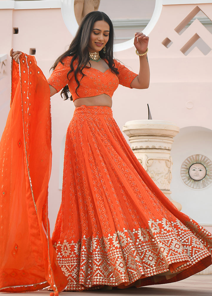 Buy Now Wedding Festive Wear Orange Designer Lehenga Choli Online in US, UK, Canada, France, Italy, Germany, Australia, Greece, UAE &amp; Worldwide at Empress.