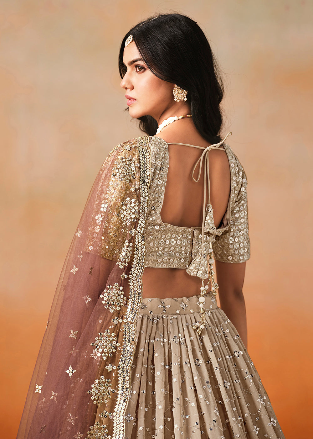 Buy Now Brown Sequins & Zari Embroidered Wedding Lehenga Choli Online in USA, UK, Canada, France, Italy, Germany, Australia, UAE & Worldwide at Empress Clothing.